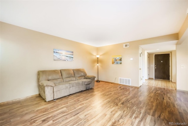 3330 Templeton Gap Rd Unit 15, Colorado Springs, CO 80907 - living area with light wood finished floors and baseboards
