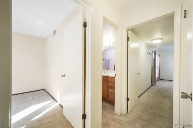 3330 Templeton Gap Rd Unit 15, Colorado Springs, CO 80907 - corridor with light carpet