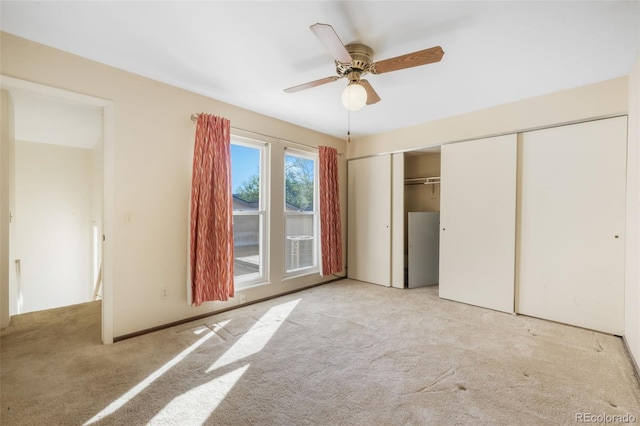 3330 Templeton Gap Rd Unit 15, Colorado Springs, CO 80907 - unfurnished bedroom featuring carpet floors, a closet, and a ceiling fan
