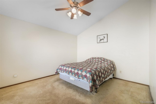 3330 Templeton Gap Rd Unit 15, Colorado Springs, CO 80907 - bedroom featuring carpet flooring, baseboards, vaulted ceiling, and ceiling fan