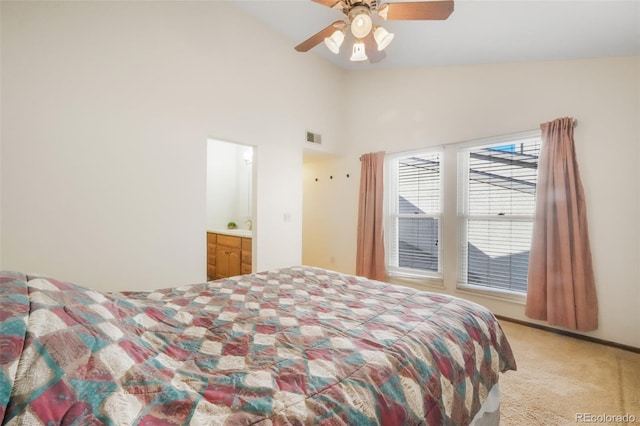 3330 Templeton Gap Rd Unit 15, Colorado Springs, CO 80907 - bedroom featuring light colored carpet, high vaulted ceiling, and ceiling fan