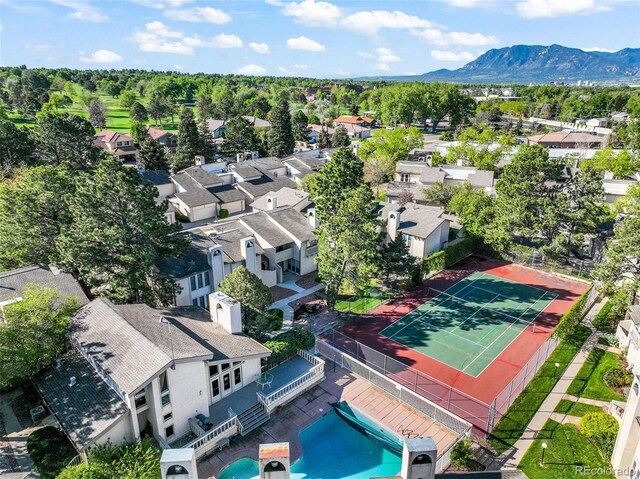 3330 Templeton Gap Rd Unit 15, Colorado Springs, CO 80907 - aerial perspective of suburban area with a pool area and a mountainous background