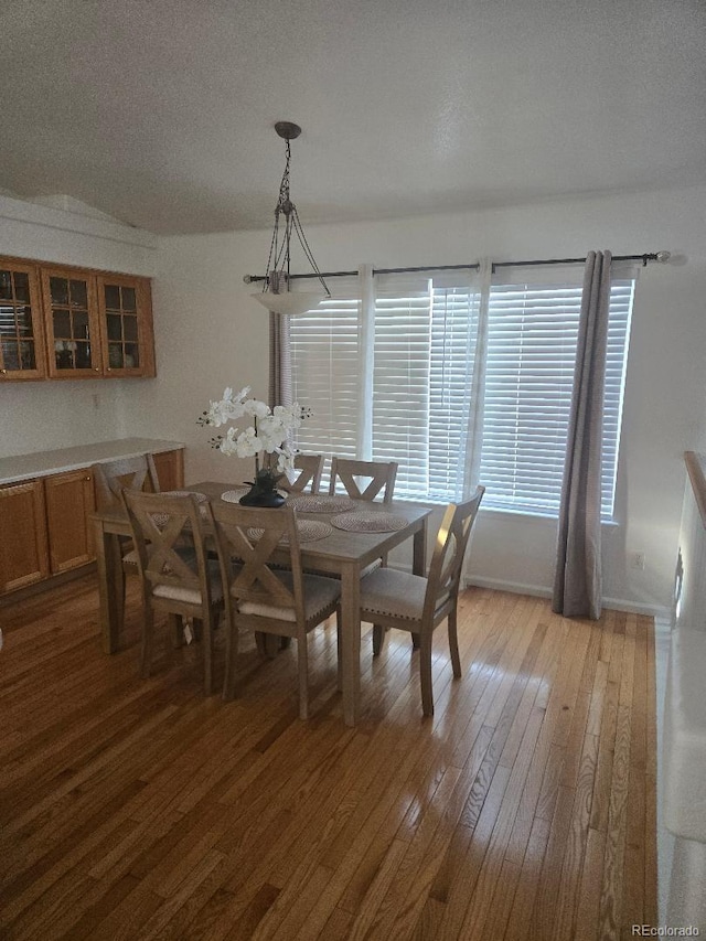 dining area featuring light wood-type flooring