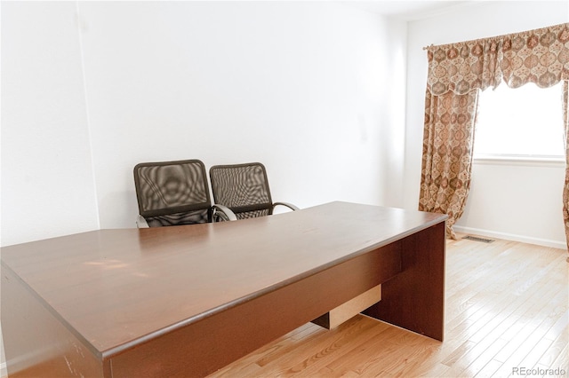 office space featuring light hardwood / wood-style floors