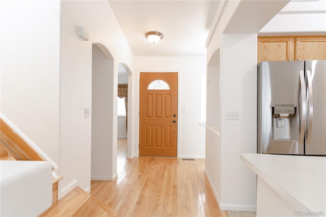 entrance foyer featuring light wood-type flooring