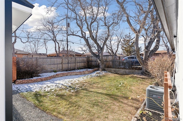 view of yard featuring central air condition unit