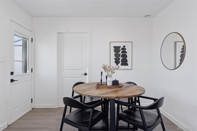 dining area featuring light hardwood / wood-style floors