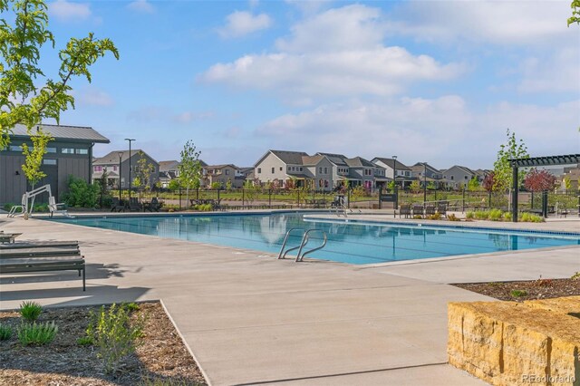 11103 Cloud Shadow St, Littleton, CO 80125 - community pool with a residential view and a patio