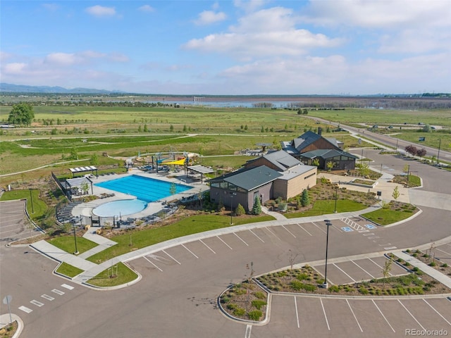 11103 Cloud Shadow St, Littleton, CO 80125 - drone / aerial view of a pool area and a large body of water