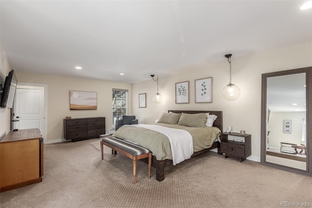 bedroom featuring recessed lighting, baseboards, and light carpet