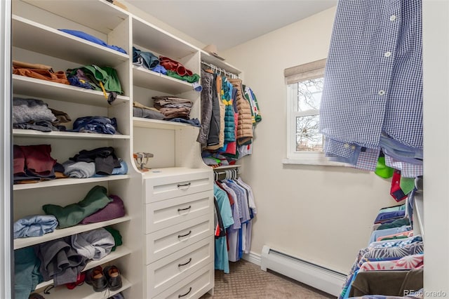 spacious closet with baseboard heating