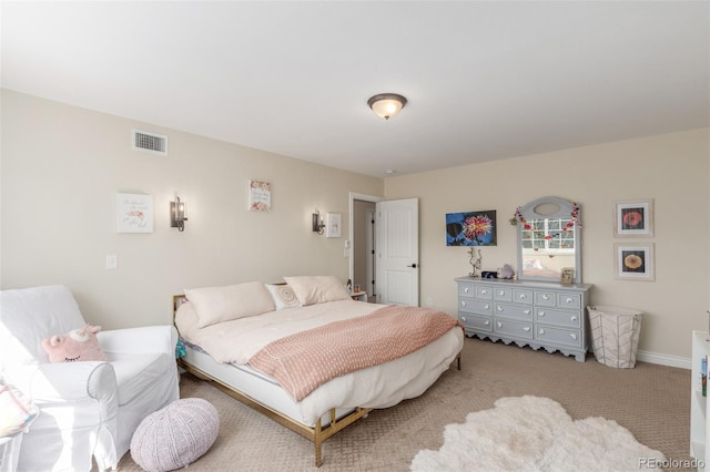 bedroom with baseboards, visible vents, and carpet floors