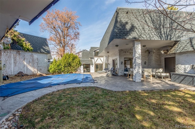 view of yard with a fenced in pool, an outdoor hangout area, and a patio area