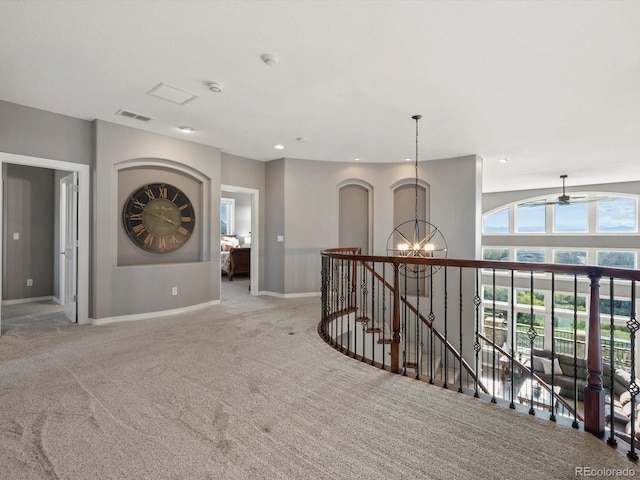 10531 Lieter Pl, Lone Tree, CO 80124 - hall with an upstairs landing, carpet, baseboards, a chandelier, and recessed lighting