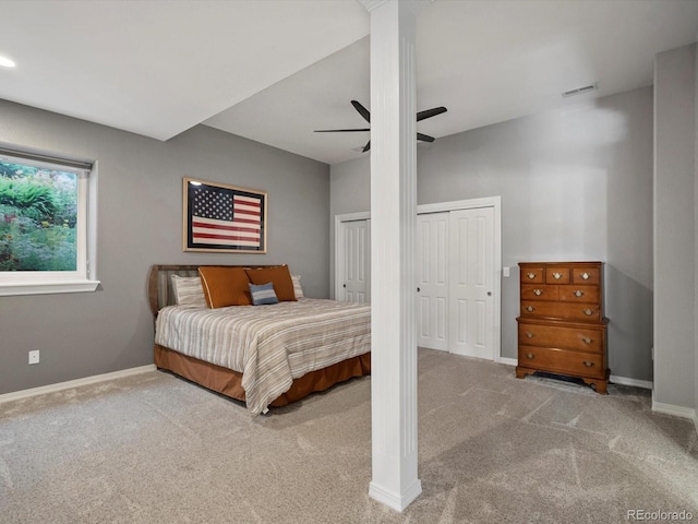 10531 Lieter Pl, Lone Tree, CO 80124 - bedroom with two closets, carpet, baseboards, and a ceiling fan
