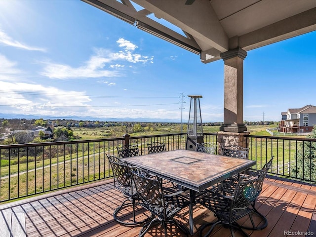 10531 Lieter Pl, Lone Tree, CO 80124 - wooden deck with outdoor dining space