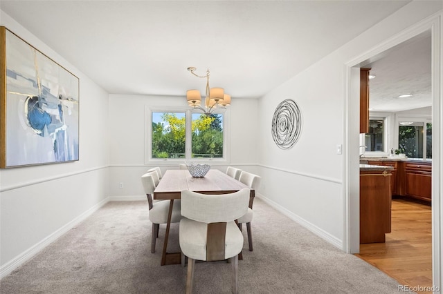 4398 Carter Trl, Boulder, CO 80301 - dining room with a chandelier and light carpet