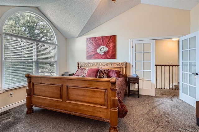 bedroom with vaulted ceiling, carpet floors, french doors, and a textured ceiling