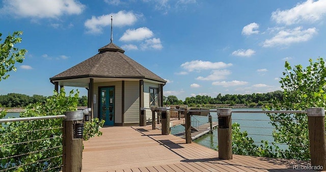 dock area featuring a gazebo and a water view