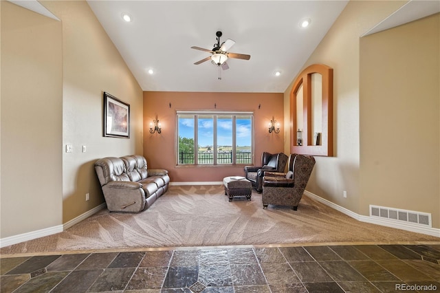31200 E 145th Ave, Brighton, CO 80603 - living area featuring dark stone finish flooring, vaulted ceiling, ceiling fan, and recessed lighting