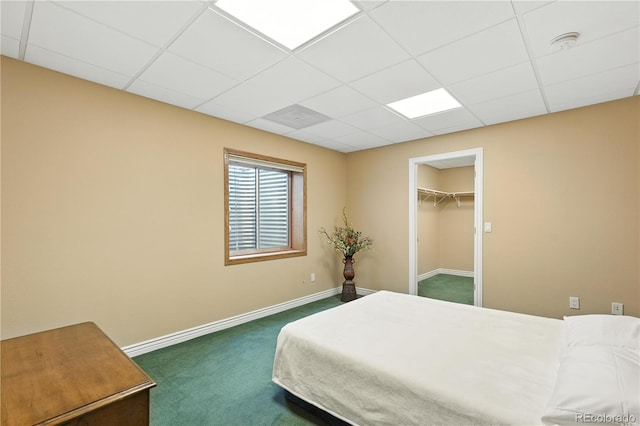 31200 E 145th Ave, Brighton, CO 80603 - bedroom featuring dark colored carpet and a drop ceiling