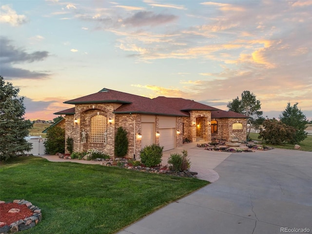 31200 E 145th Ave, Brighton, CO 80603 - view of front of property with brick siding, concrete driveway, a garage, and roof with shingles
