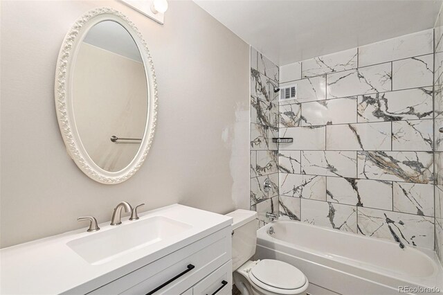 full bathroom featuring toilet, visible vents, bathing tub / shower combination, and vanity