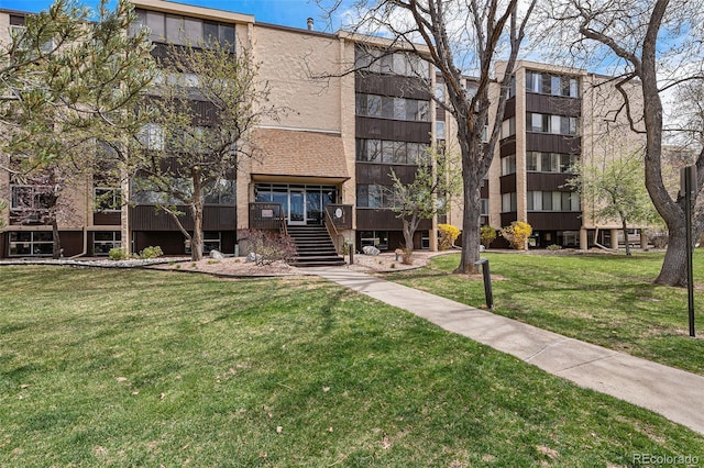 3460 S Poplar St Unit 404, Denver, CO 80224 - view of apartment building / complex featuring stairway