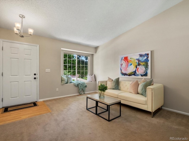 2548 Foothills Canyon Ct, Highlands Ranch, CO 80129 - carpeted living area with a textured ceiling and a chandelier