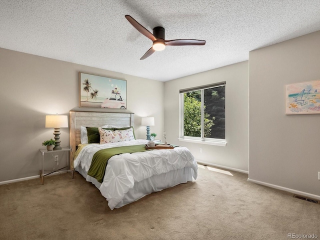 2548 Foothills Canyon Ct, Highlands Ranch, CO 80129 - bedroom featuring carpet, a textured ceiling, and ceiling fan