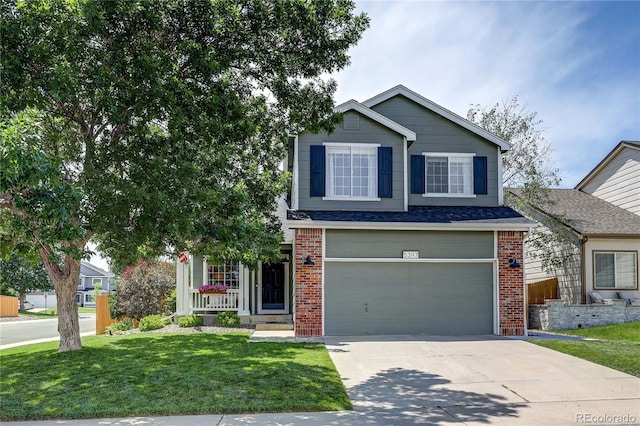 5397 S Killarney St, Centennial, CO 80015 - view of front of house with an attached garage, a front lawn, concrete driveway, and brick siding