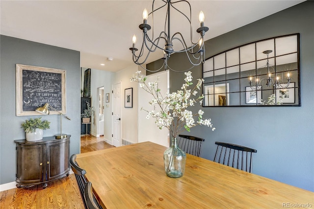 5397 S Killarney St, Centennial, CO 80015 - dining room with a chandelier and wood finished floors