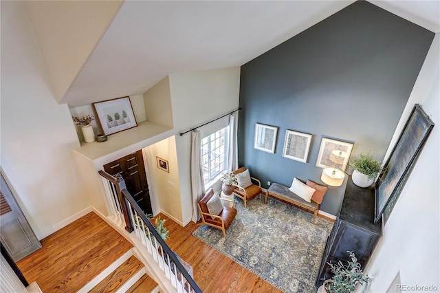 5397 S Killarney St, Centennial, CO 80015 - living area featuring wood finished floors and lofted ceiling