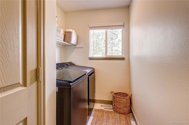 5397 S Killarney St, Centennial, CO 80015 - laundry room with washing machine and dryer and baseboards