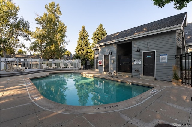 view of swimming pool featuring a patio