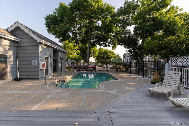 view of pool featuring a patio