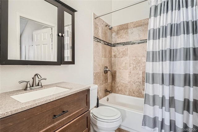 full bathroom with vanity, toilet, and shower / bath combo with shower curtain