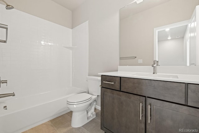 full bathroom featuring vanity, tile patterned floors,  shower combination, and toilet