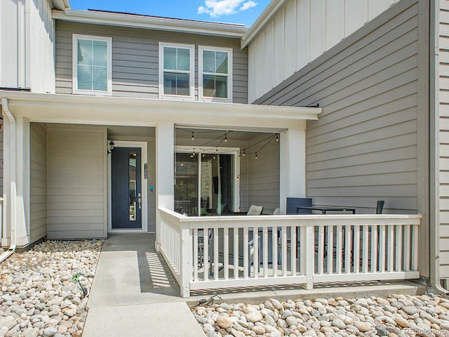 7488 W Pacific Ln, Denver, CO 80227 - entrance to property featuring board and batten siding