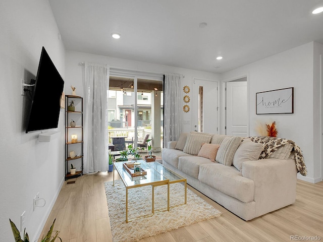 7488 W Pacific Ln, Denver, CO 80227 - living area with light wood-style floors and recessed lighting