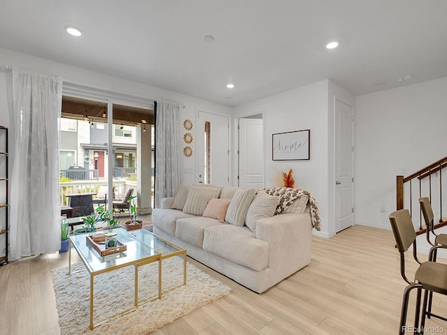 7488 W Pacific Ln, Denver, CO 80227 - living room with light wood-type flooring and recessed lighting