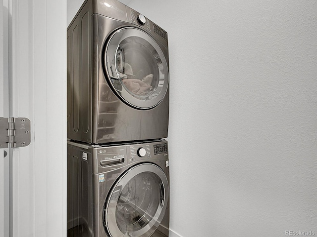 7488 W Pacific Ln, Denver, CO 80227 - laundry room with estacked washer and dryer