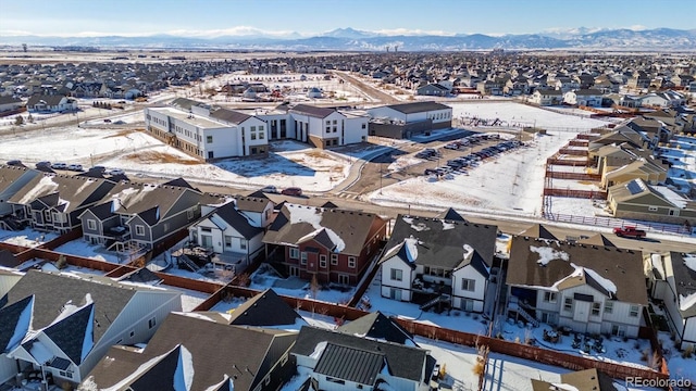 birds eye view of property featuring a mountain view