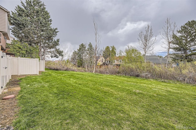view of yard with fence