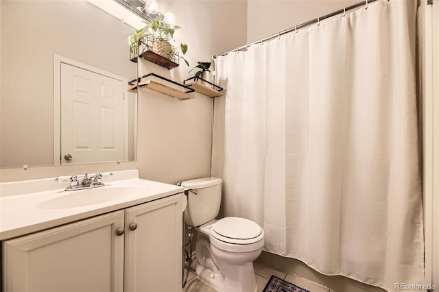 full bath with toilet, curtained shower, tile patterned flooring, and vanity