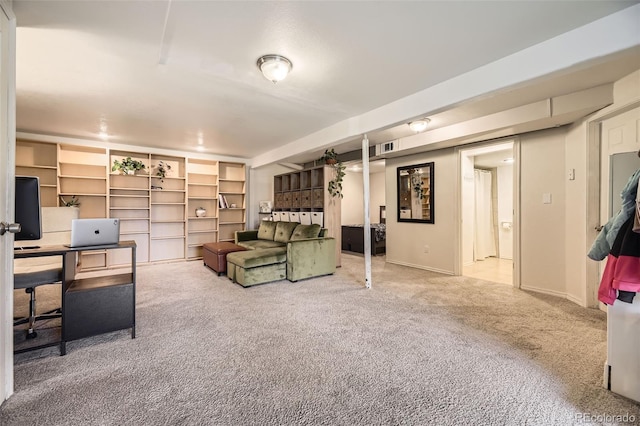 living room with carpet flooring and baseboards