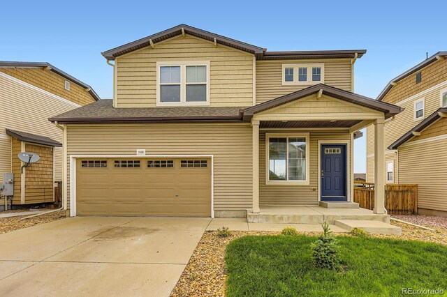 1998 Coach House Loop, Castle Rock, CO 80109 - view of front facade with a garage, driveway, and a porch