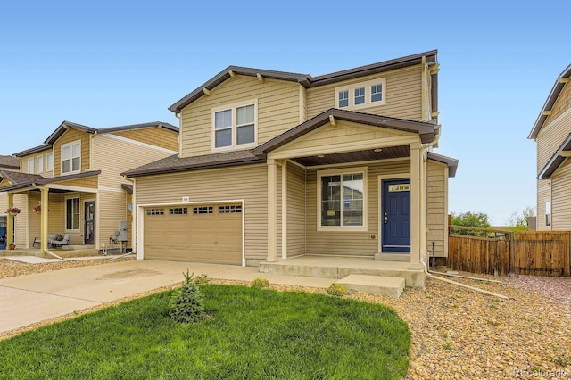 1998 Coach House Loop, Castle Rock, CO 80109 - view of front facade with covered porch, concrete driveway, and an attached garage