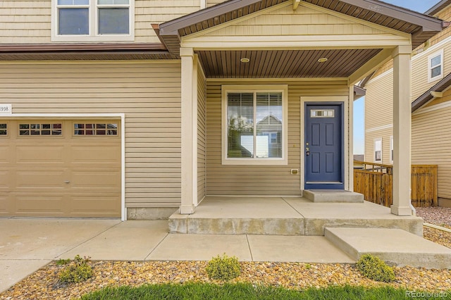 1998 Coach House Loop, Castle Rock, CO 80109 - view of exterior entry with a porch and an attached garage