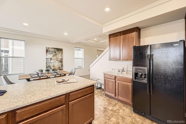 1998 Coach House Loop, Castle Rock, CO 80109 - kitchen with black refrigerator with ice dispenser, recessed lighting, brown cabinets, and light stone counters